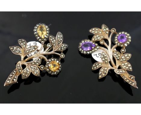 An amethyst and marcasite floral spray brooch and a selection of citrine and marcasite jewellery including a matching floral 