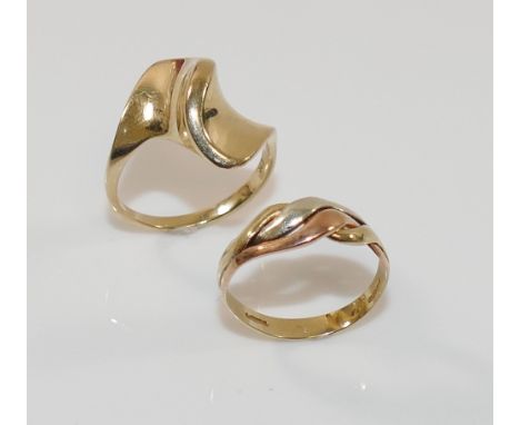 Two 9 carat gold rings comprised of a tri-colour ring, finger size L, and an abstract ring, finger size O1/2, combined weight