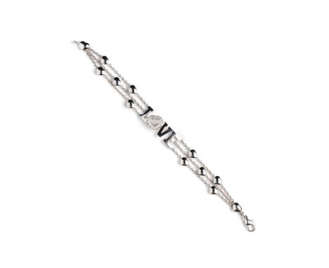 WHITE GOLD 'HAPPY DIAMONDS' BRACELET, CHOPARD  with an openwork plaque forming the word LOVE, the heart-shaped 'O' set with b