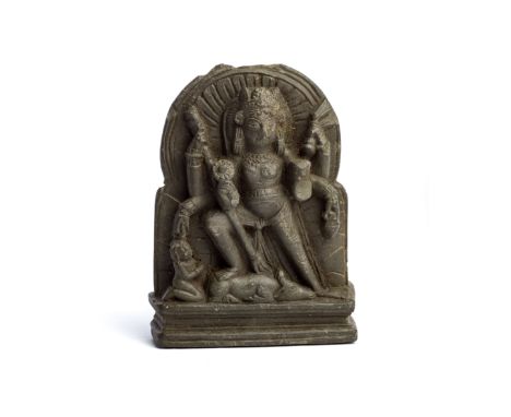 A SMALL BLACK STONE PLAQUE DEPICTING DURGA MAHISASURAMARDINI, KASHMIR, CIRCA 9TH CENTURY   the six-armed Hindu goddess with h