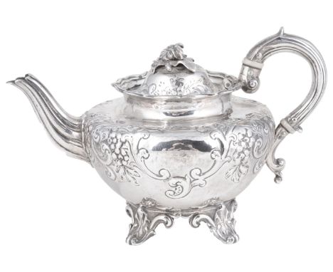 A VICTORIAN SILVER BACHELOR'S TEAPOT, HENRY HOLLAND &amp; SON, LONDON, 1860  chased to the shoulder with scroll foliage surro