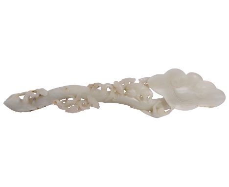 A CHINESE WHITE JADE 'LINGZHI AND MONKEY' RUYI SCEPTRE  naturalistically carved as a 'lingzhi' with large ruyi head, the curv