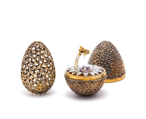 A SILVER-GILT 'SURPRISE' EGG, STUART DEVLIN, RETAILED BY ANDREW GRIMA, LONDON, 1967  covered in crater-like texturing with a 