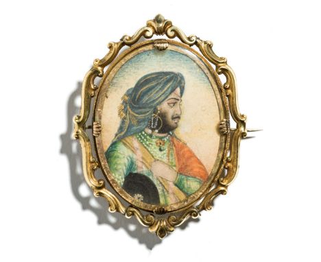 A PORTRAIT OF A SIKH NOBLEMAN, DELHI OR PUNJAB, INDIA, MID-19TH CENTURY  gouache with gold on paper, of oval form, set into a