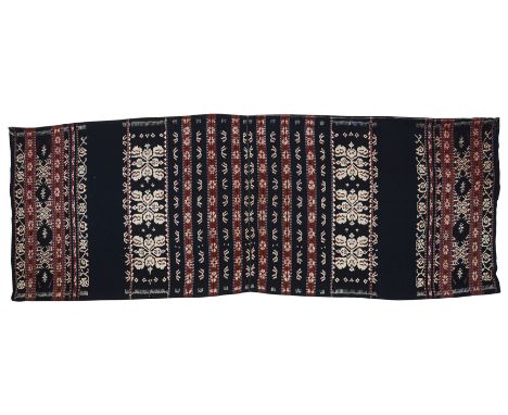 A COTTON WARP IKAT, SAVU OR ROTI ISLAND, INDONESIA, FIRST HALF 20TH CENTURY  of rectangular form, composed of two pieces stit