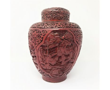 A CHINESE CINNABAR LACQUER AND WOOD JAR AND COVER, 20TH CENTURY  the baluster body rising from a short foot to a rounded shou