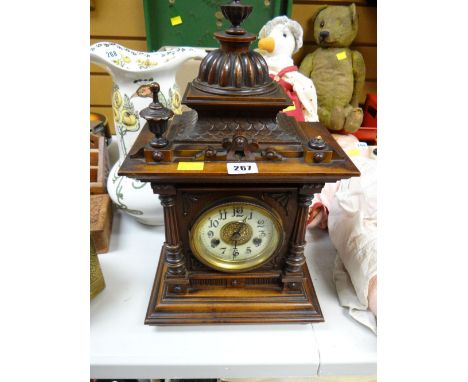 A late nineteenth century architectural mahogany mantel clock