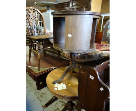 A vintage revolving circular drum shaped library table together with a circular side table with small drawer