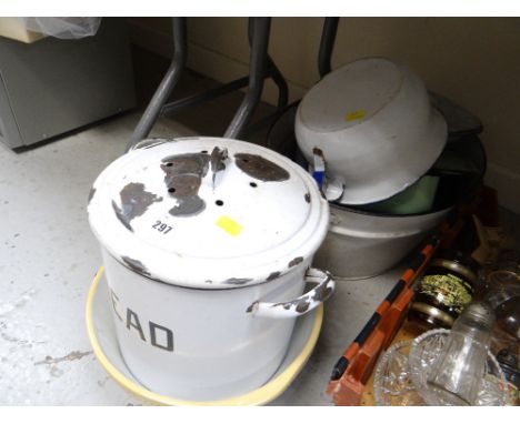 A parcel of enamel kitchen items together with a pottery mixing bowl