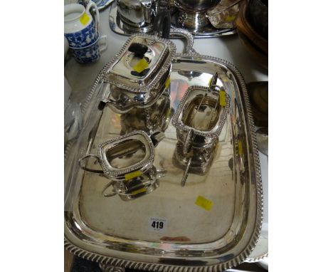 A three-piece EPNS tea service on a similar EPNS twin-handled tray