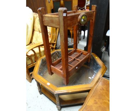 Reproduction octagonal glass topped coffee table with rattan shelf together with a wooden stick / umbrella stand