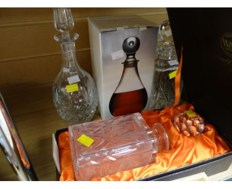 A cased Webb hand cut crystal decanter & three further cut glass decanters