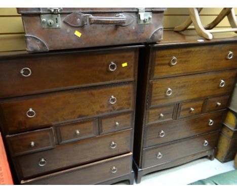 A suite of Stag bedroom furniture comprising two-door wardrobe, pair of matching tall chests of drawers, bedside cabinets & t