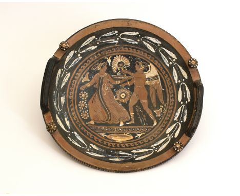 An Apulian red-figured PhialeSecond half of 4th century BC; diam. cm 40; A gently curving plate with a flat rim, on a moulded