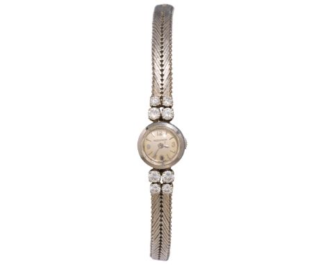 Damen-Armbanduhr, Jaeger LeCoultre18 Karat Weißgold, 6 Brillanten, Uhrenband in Flechtoptik; auf dem Zifferblatt signiert: "J