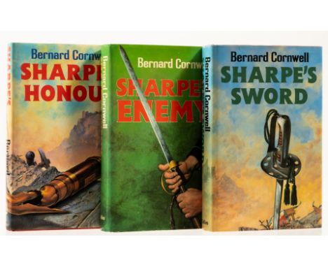 NO RESERVE Cornwell (Bernard) Sharpe's Sword, jacket with light sunning to spine and some marking to flaps, 1983; Sharpe's En