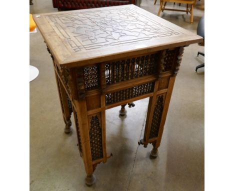 Aa Arts and Crafts Moorish style carved beech occasional table 