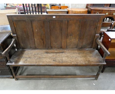 An 18th Century and later oak bench 