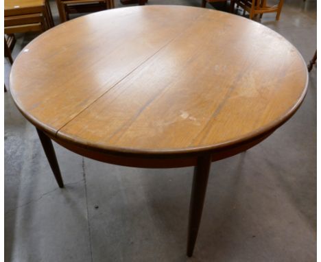 A G-Plan Fresco teak circular extending dining table 