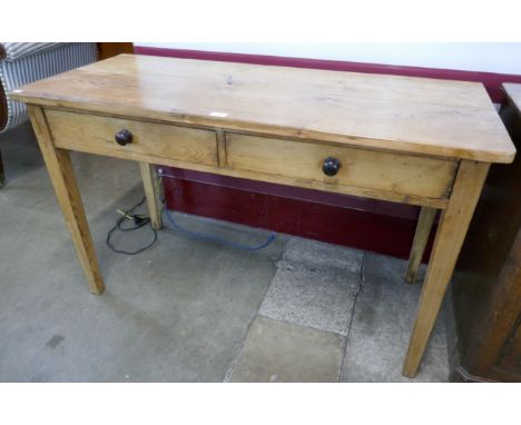 A Victorian pine two drawer kitchen serving table 