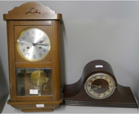 A German wooden cased wall clock and a mantel clock 