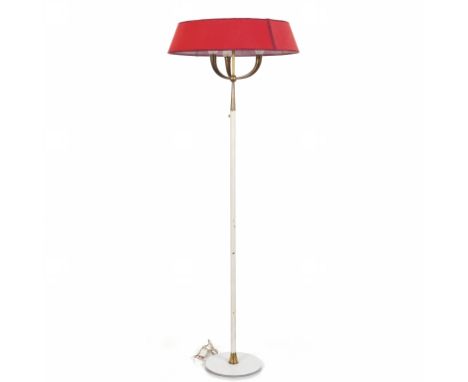 UNA LAMPADA DA TERRA  anni '50. Marmo  ottone  ottone laccato  paralume di tela. Altezza cm 165. A FLOOR LAMP  1950's. Marble