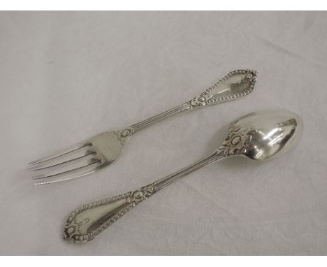A Victorian silver spoon and fork having moulded decoration to stem and terminals, London 1863, Chawner & Co