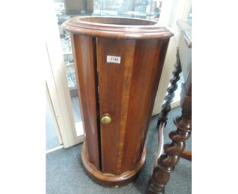 A 19th century mahogany cylindrical commode base of fluted design originally from Wray Castle on Windermere