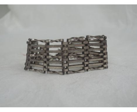 An HM silver seven bar gate bracelet 