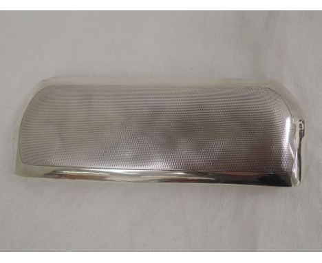 A silver spectacles case having engine turned decoration and velvet lining, Birmingham 1934, marks worn