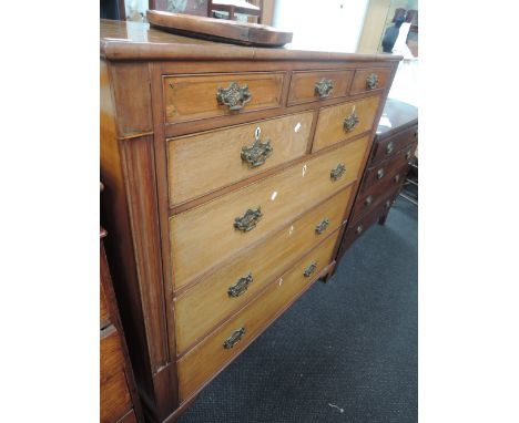 A 19th century oak chest of 3 frieze, 2 short and 3 long drawers having brass inlay decoration, on bracket feet