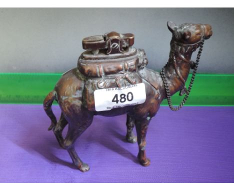 A Spelter lighter modelled as a Camel