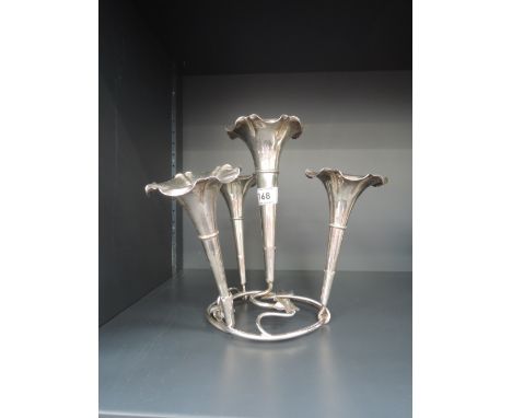 A silver plated table centre/epergne having a central trumpet with three further surrounding on a foliate decorated stand