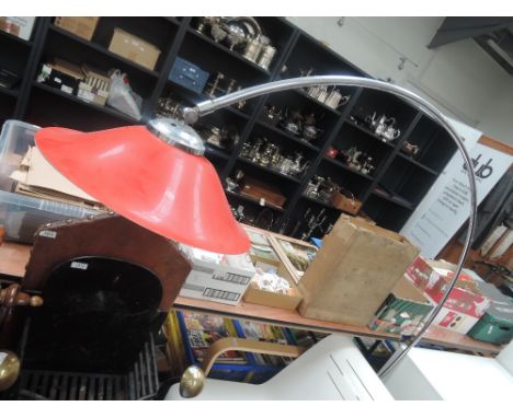 A late 20th century chrome and red plastic modernist room light of arch Eureka design - collectors item only