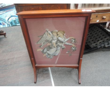 A late Victorian mahogany firescreen having beadwork pictorial inset depicting angel and child