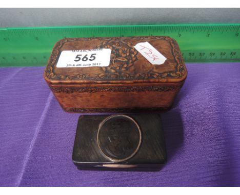 A 19th century treen snuff box having foliate decoration and a 19th century snuff box with Duke of Wellington portrait medall