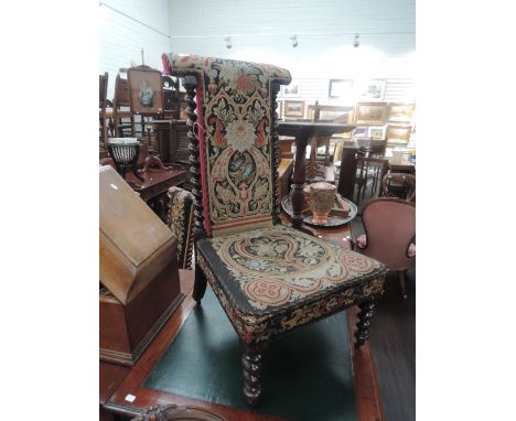 A Victorian mahogany Prie Dieu prayer chair having twist frame and upholstery tapestry