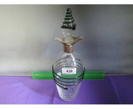 An early 20th century Art Nouveau glass decanter having stylised green wrythen applique and HM silver collar 