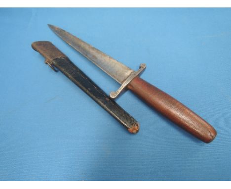 A French possibly early 1900's trench dagger with scabbard, triangular section blade with engraving and French inscription