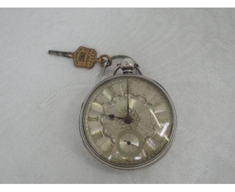 A Victorian silver key wound pocket watch having a fusee movement and Roman numeral dial and subsidiary seconds to engine tur
