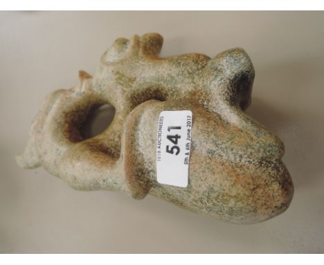 A jade figure modelled as a dragon on phoenix totem