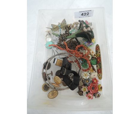 A small selection of costume jewellery including brooches, bangles, coral bead necklace, cufflinks, buttons etc