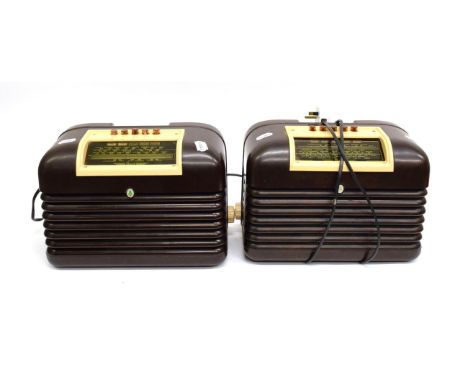 Two Bush Type DAC10 Wireless Receivers, with push-button rank cream bakelite surrounds and mottled brown bakelite cases; and 