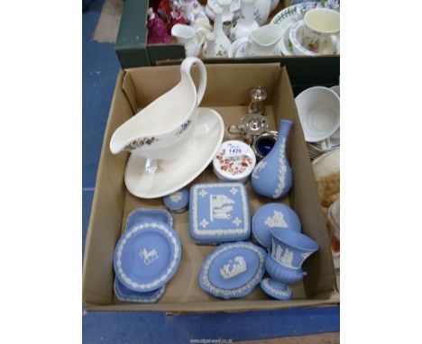 A quantity of Wedgwood blue Jasperware to include bud vases, trinket pots, plated cruet set, etc.
