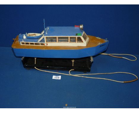 An apparently scratch-built model Police type Launch ''Pamela'' having battery driven propeller, and with a rowing boat on th