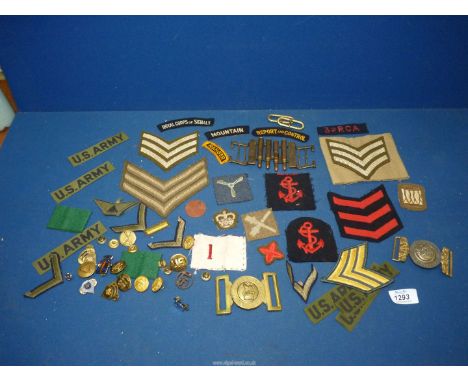 A quantity of military buttons and fabric patches including U.S Army, Royal Corps of Signals etc.