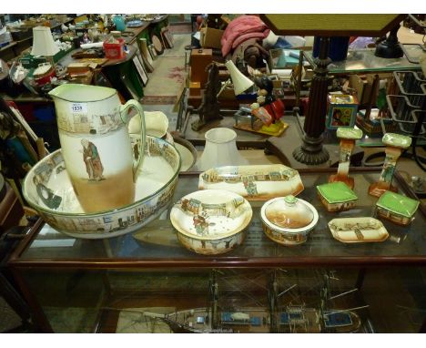 A Royal Doulton Dickens' ware bedroom set of wash jug (a/f) and bowl, a soap dish, a sponge/flannel dish, trinket pots, candl