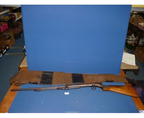A BSA 'The Lincoln' under-lever .177 calibre air rifle, model 8761/04 Serial No. CS 54865, with leather and canvas gun slip. 