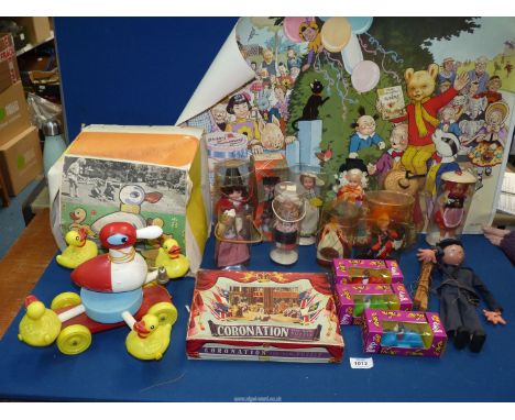 A quantity of miscellanea to include;  child's vintage pull-along duck, Souvenir dolls, Scottish Piper boy 'Busby', Coronatio