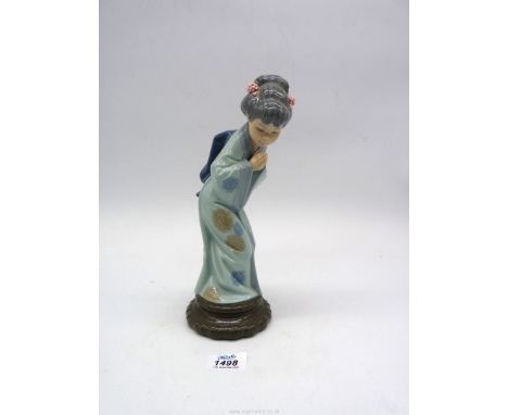 A Lladro Geisha figure 1978.
